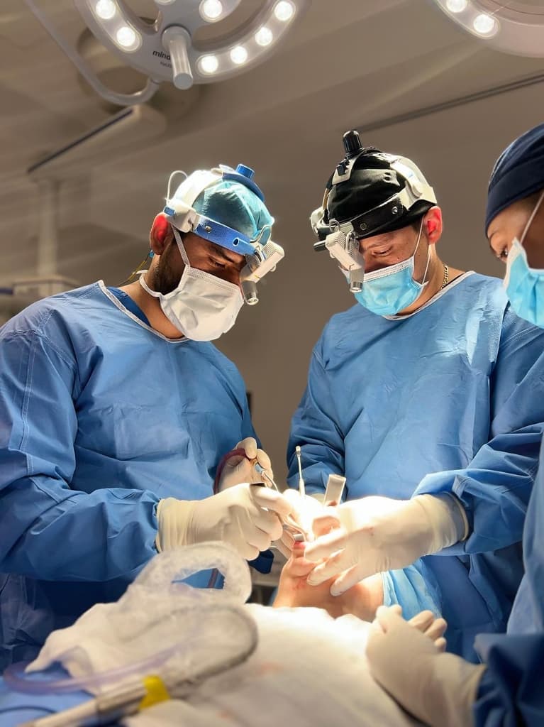 Dr. Varad Saptarshi at work in the operating room.